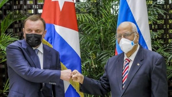 Russian Deputy Minister Yuri Borisov and Cuban Vice-President Ricardo Cabrisas meet in Havana on March 32, 2021.