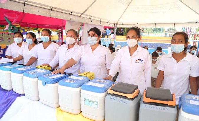 Nurses receive vaccine containers, Managua, Nicaragua, Apr. 6, 2021.