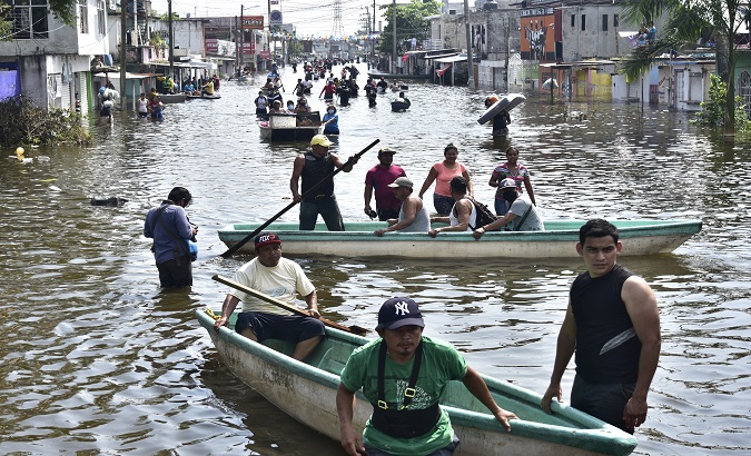 People evacuate due to the passage of tropical storm Eta, Tabasco, Mexico, Nov. 9, 2021.