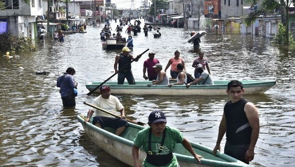 People evacuate due to the passage of tropical storm Eta, Tabasco, Mexico, Nov. 9, 2021.