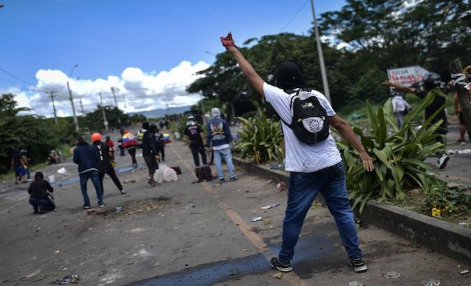 People protest in Buga, Colombia, May 13, 2021.