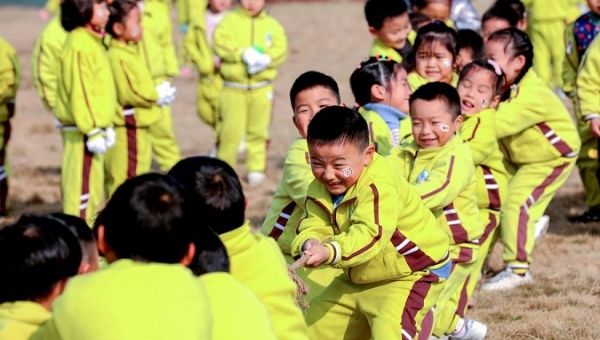 Children take part in the tug-of-war game, Huzhou City, China, Dec. 25, 2020.