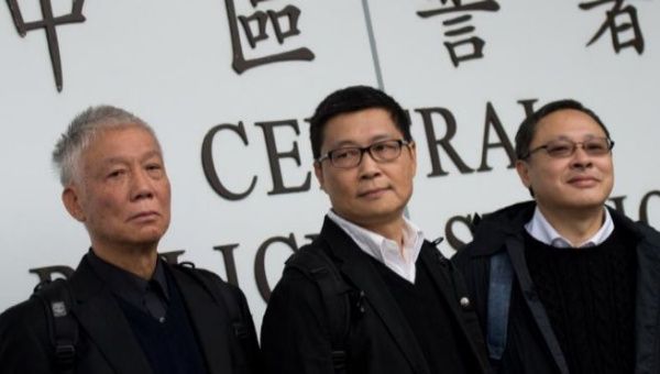 Chu Yiu-ming (left), Chan Kin-man (center), Benny Tai (right). (Photo: AFP)