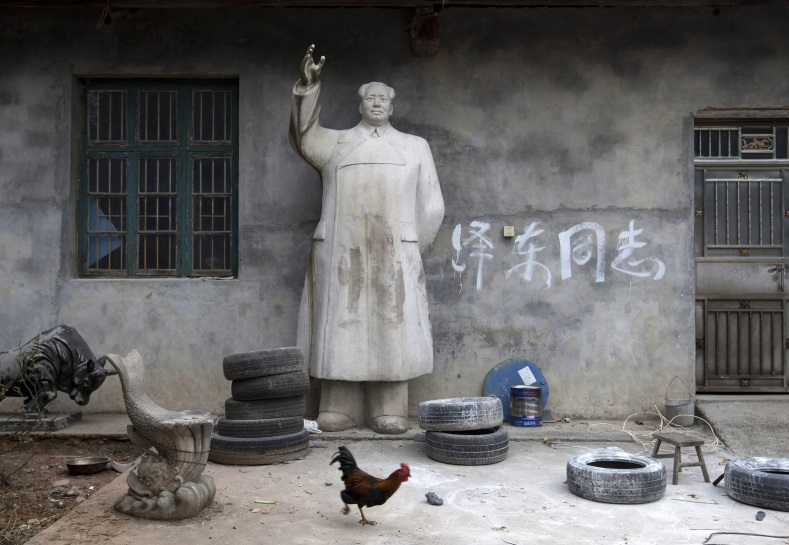 A limestone statue of China's late Chairman Mao Zedong is seen in a yard in Shaoshan, Hunan province, Dec. 6, 2014. Friday, Dec. 26, 2014 marked the 121st birth anniversary of Mao.