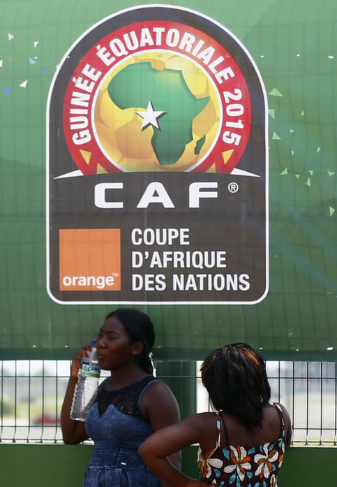 Fans wait to buy tickets for the upcoming African Nations Cup outside the Estadio de Bata 