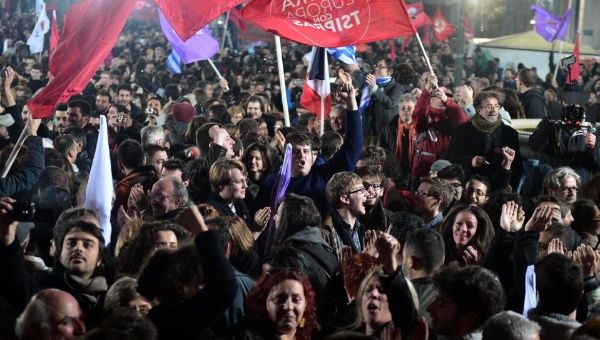 Syriza supporters celebrate following victory