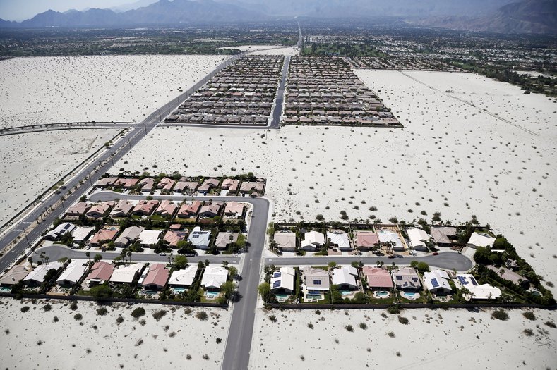 Homes with swimming pools are seen in the Palm Springs area, California April 13, 2015. The average daily water usage per person in Palm Springs is 201 gallons, more than double the California average.