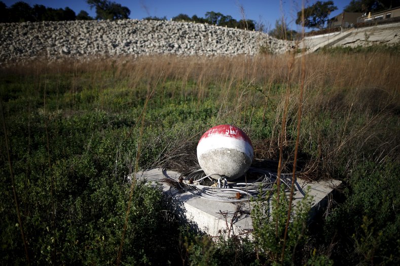 A buoy is seen where the water receded at Lake Cachuma in Santa Barbara, California March 27, 2015.