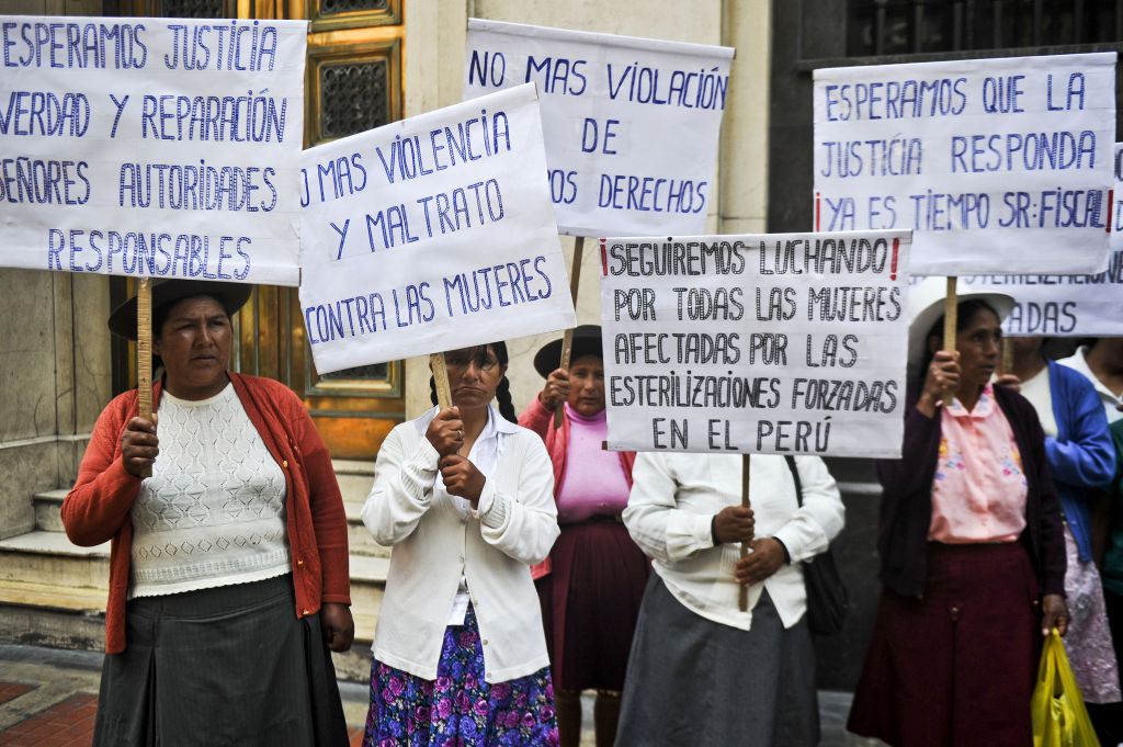 Peruvian Andean women, victims of forced sterilizations during the administration of former President Alberto Fujimori, protest in Lima on February 13, 2014.