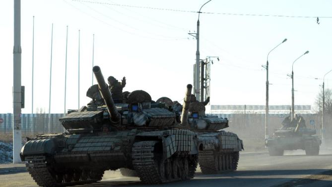 Ukrainian rebels ride tanks in the eastern Ukrainian city of Lugansk on February 21 .