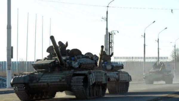 Ukrainian rebels ride tanks in the eastern Ukrainian city of Lugansk on February 21 .