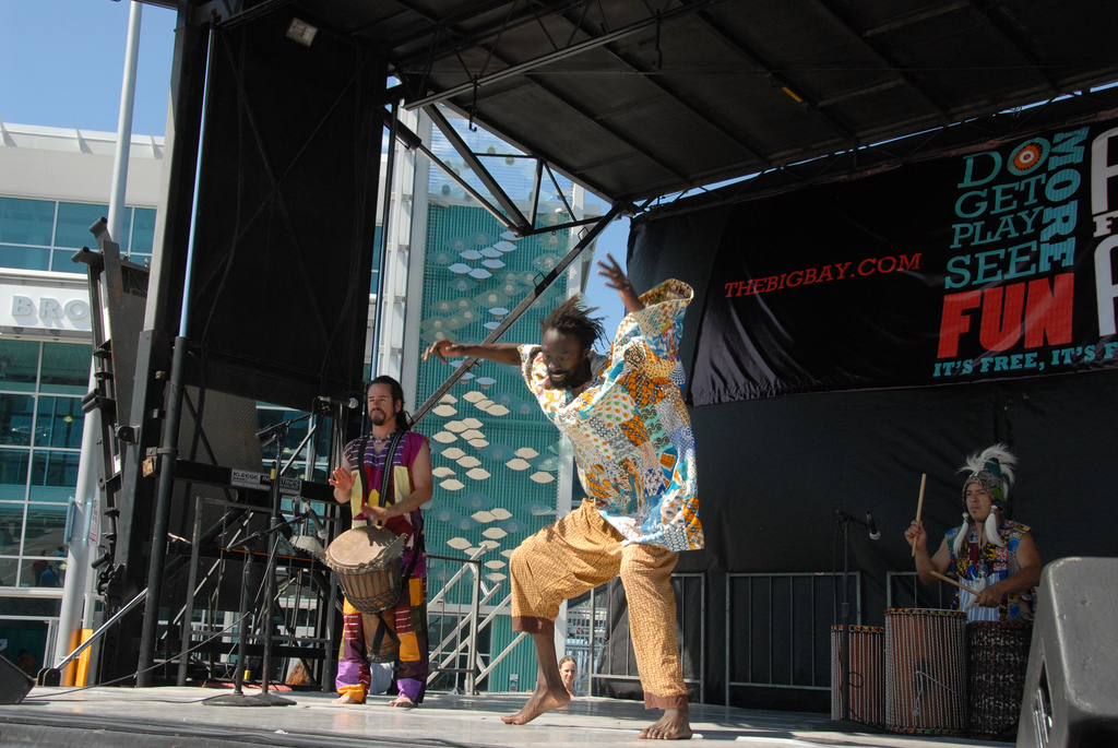 Worldbeat Cultural Center African Drum & Dance Ensemble performed at Fall for the Arts festival in San Diego, California. African rhythm and dance has highly influenced U.S. and world cultures.