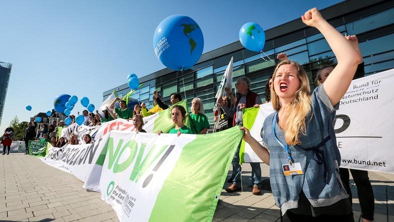 Climate activists protest at the U.N. climate talks calling for 