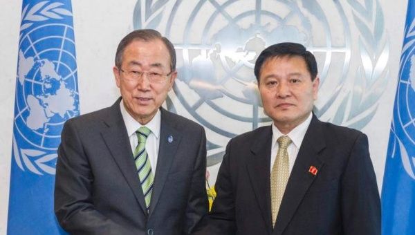 UN Secretary-General Ban Ki-moon (L) greets North Korea's new ambassador to the United Nations, Ja Song Nam, at the United Nations headquarters in New York, February 28, 2014.