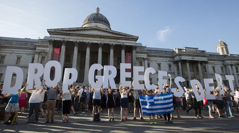 Demonstrators gather to protest against the European Central Bank's handling of Greece's debt repayments, in Trafalgar Square in London, Britain, June 29, 2015.