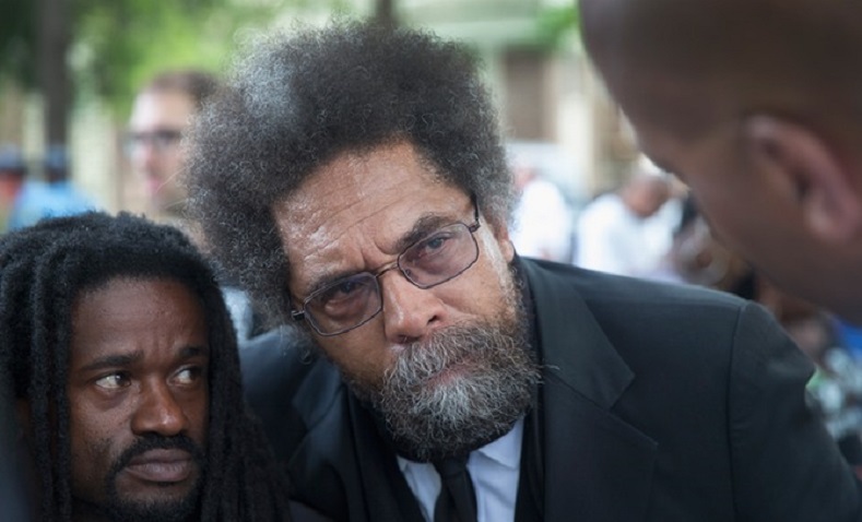 Cornel West (C) was among many activists and protesters detained by the Ferguson police.