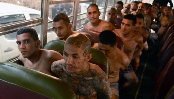 Gang members are transferred by bus to a high-security prison in Izalco, El Salvador on April 24, 2015.