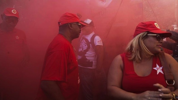 A group of demonstrators express support for former Brazilian president Lula da Silva during during an act against hatred and political intolerance, Aug. 7, 2015.