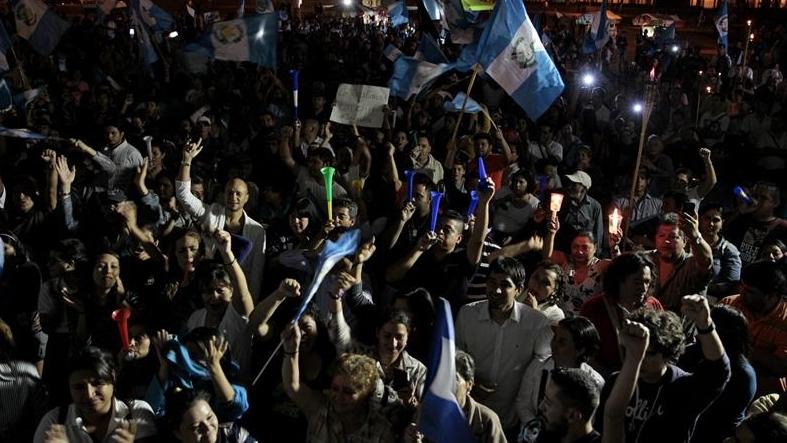 Protesters celebrate gains in the fight against corruption August 21, 2015.