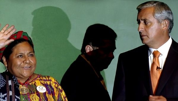 Rigoberta Menchu (L) and now-President Otto Perez Molina during presidential candidate debates in 2007.