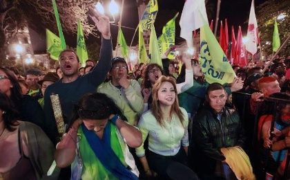 People attend a concert in support of the government in Quito, Aug. 13, 2015.