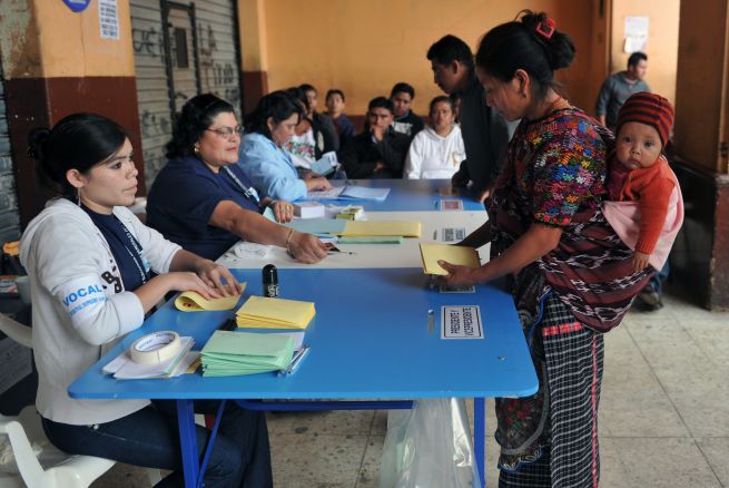 An indigenous woman votes in Guatemala's 2011 elections