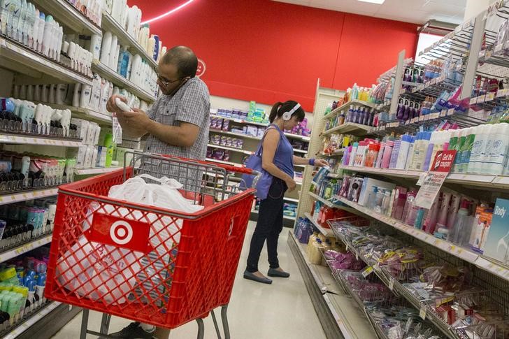 Customers shop in the pharmacy department of a Target store in the Brooklyn borough of New York