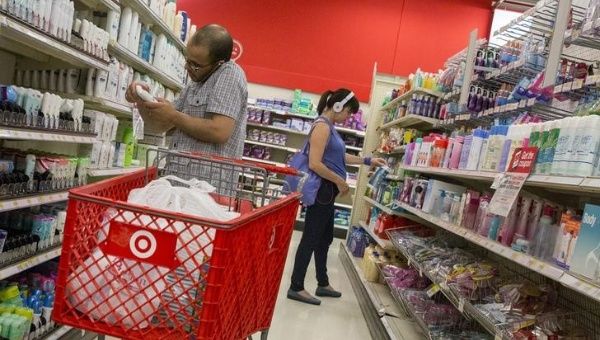 Customers shop in the pharmacy department of a Target store in the Brooklyn borough of New York 