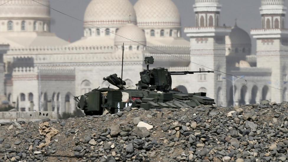 A tank stands close to the Presidential Palace in the capital city of Sanaa