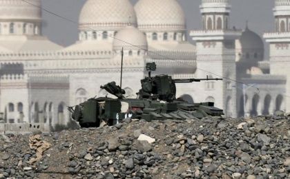 A tank stands close to the Presidential Palace in the capital city of Sanaa