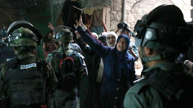 Palestinian women demonstrate in an alley outside the Al-Aqsa mosque compound in Jerusalem's Old City, on Sept. 14, 2015.