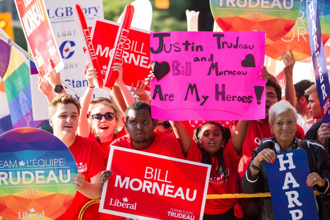 Supporters of Canada’s main federal parties rally outside the site of the first leader’s debate in Toronto, Canada, on August 6, 2015. The federal election is set for October 19, 2015.