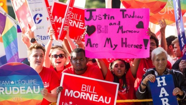 Supporters of Canada’s main federal parties rally outside the site of the first leader’s debate in Toronto, Canada, on August 6, 2015. The federal election is set for October 19, 2015.