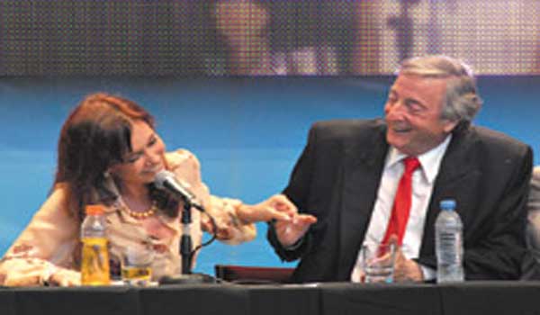 Argentina's President Cristina Fernandez (L) and her late husband, former President Nestor Kirchner.