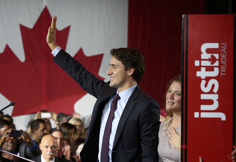 The Liberal Party's Justin Trudeau waves to supporters after winning Canada's Oct. 19 election.