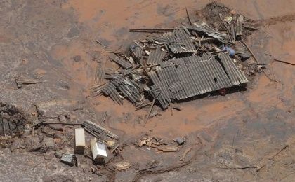 Debris is pictured in the Bento Rodigues district, which was covered with mud after a dam owned by Vale SA and BHP Billiton burst, Brazil, Nov. 10, 2015.