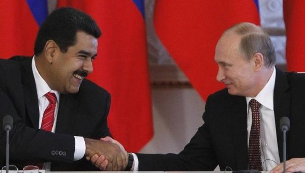 Venezuelan President Nicolas Maduro (L) will meet with Russian President Vladimir Putin in Iran as part of the Gas Exporting Countries Forum Summit.