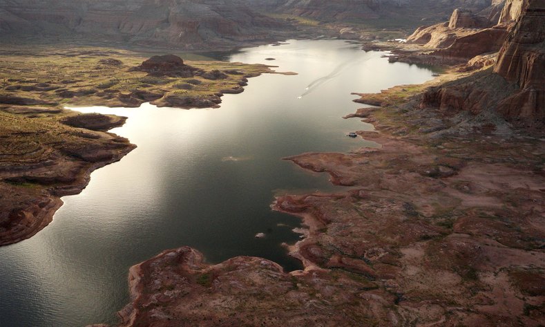 Huge areas of dry ground which would be under water when the lake is full are seen at Lake Powell.