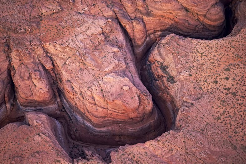 A narrow slot canyon is seen from the air at Lake Powell.