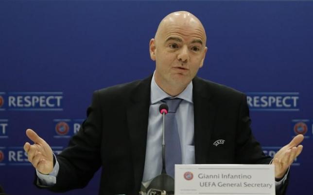 Gianni Infantino addresses a news conference after a UEFA Executive Committee meeting ahead of the annual congress in Vienna Mar.23, 2015.