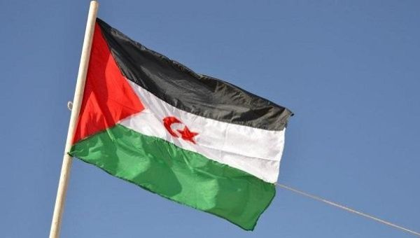 The flag of the Frente Polisario's partially recognized Sahrawi Arab Democratic Republic flies in the disputed territory of Western Sahara.