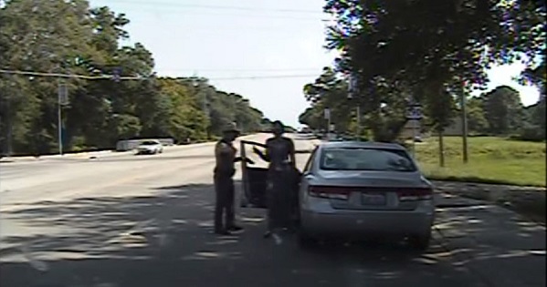 Texas state trooper Brian Encinia points a Taser at Sandra Bland, in this image captured from the police dashcam video in Prairie View, July 10, 2015.