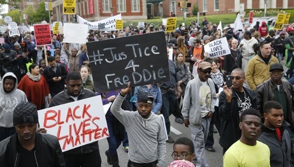 Protesters are gathered for a rally to protest the death of Freddie Gray, who died following an arrest in Baltimore, Maryland, April 25, 2015.