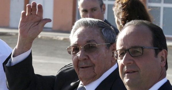 Cuban President Raul Castro with his French counterpart Francois Hollande as the latter landed in Cuba for an official visit in May 2015.