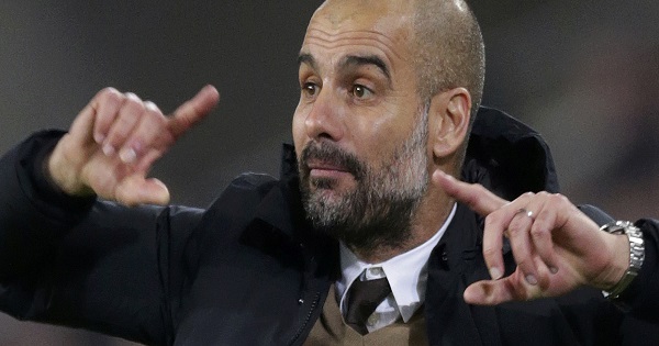 Bayern Munich's manager Pep Guardiola gestures during his team's match against Hanover 96 at the HDI Arena, Hanover, Germany, Dec. 5, 2015.