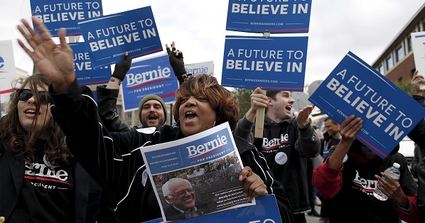 Doretha Jackson (C), a Bernie Sanders supporter from Ladson, South Carolina, shouts Sanders slogans along Calhoun Street before the start of the NBC News-YouTube Democratic Debate in Charleston, South Carolina.