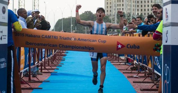 Argentinian Juan Manuel Asconape celebrates at the finish line as he wins the first place in the Ibero-American Triathlon Championship in Havana, on Jan. 25, 2015