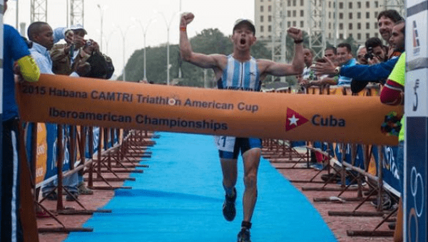 Argentinian Juan Manuel Asconape celebrates at the finish line as he wins the first place in the Ibero-American Triathlon Championship in Havana, on Jan. 25, 2015