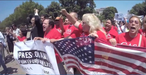 Latinos join a protest in the United States.