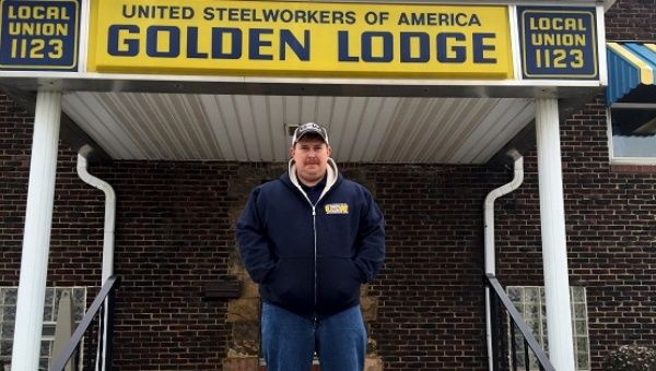 Curtis Green, vice president of the United Steelworkers' local union, poses for pictures in Canton, Ohio.